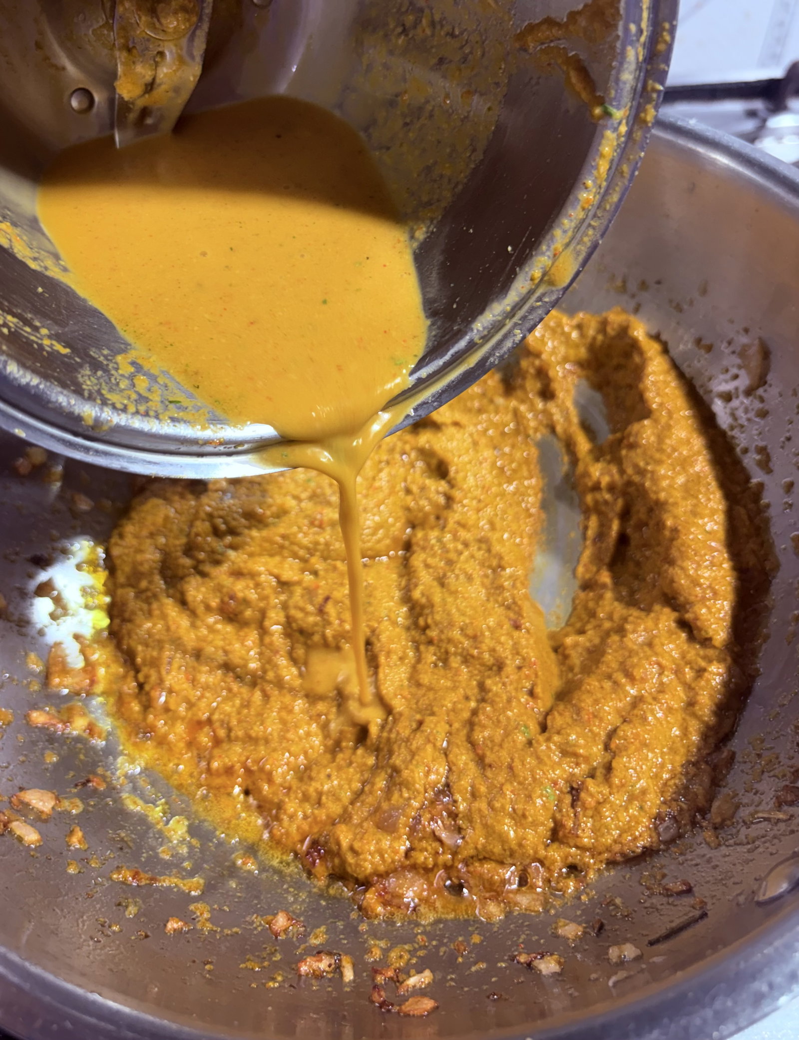 Step 3.1: Add the prepared masala paste and a splash of water