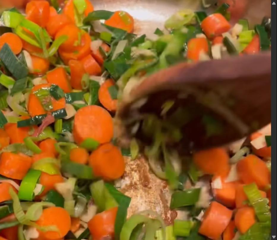 Step 1.1: Add olive oil to the same pot and cook carrots and leeks for 3-5 minutes until softened