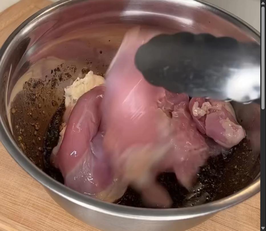 Step 1.1: Add chicken thighs to the marinade and toss to coat evenly