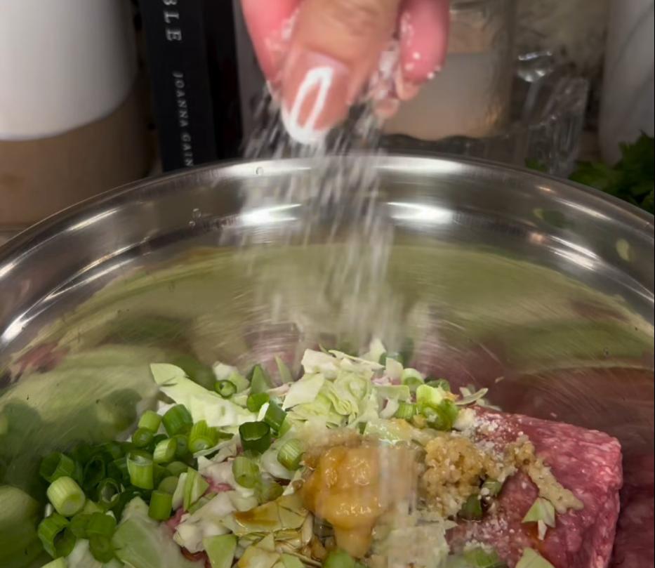 Step 1.1: Combine ground pork, chopped green cabbage, green onions, garlic, ginger or ginger paste, soy sauce, rice vinegar, sesame oil, salt, pepper, and red chili flakes in a bowl
