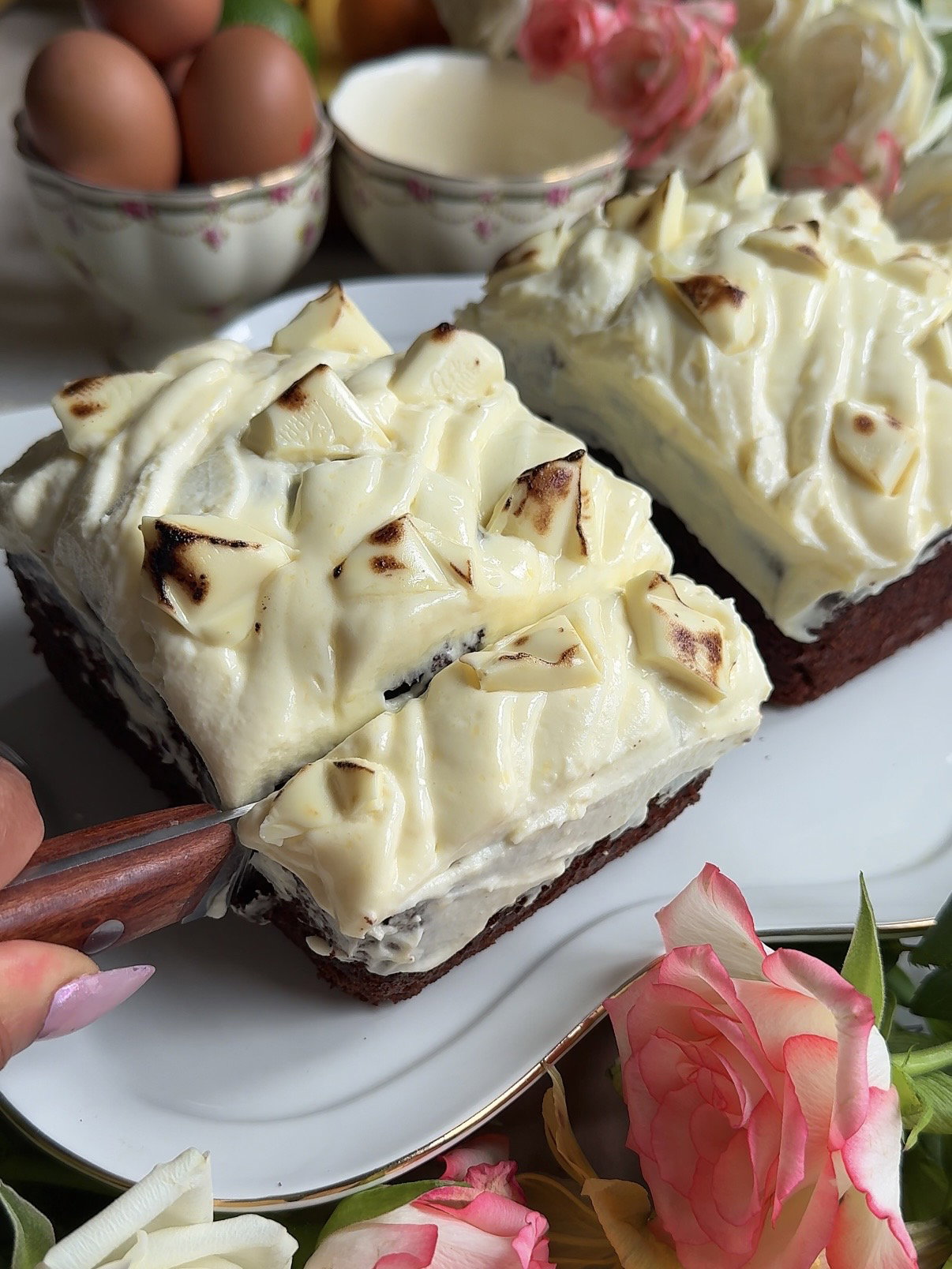 Step 4.1: Top the frosted loaf with torched white chocolate if desired