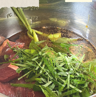 Step 2.1: Add the beef, water, aromatics, and ground spices to the Instant Pot