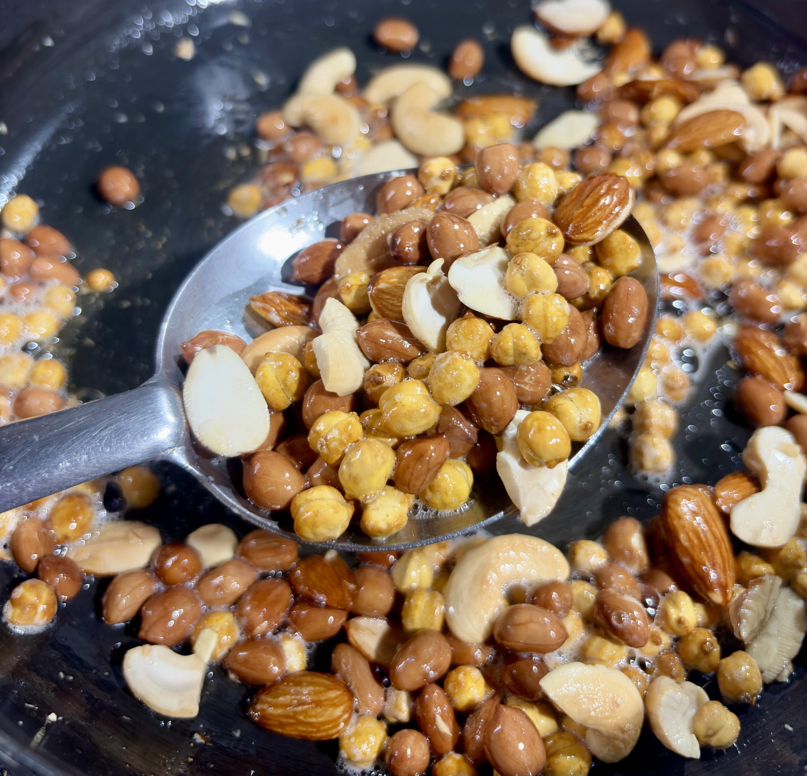 Step 2.2: Stir in the roasted chana and fry for a minute