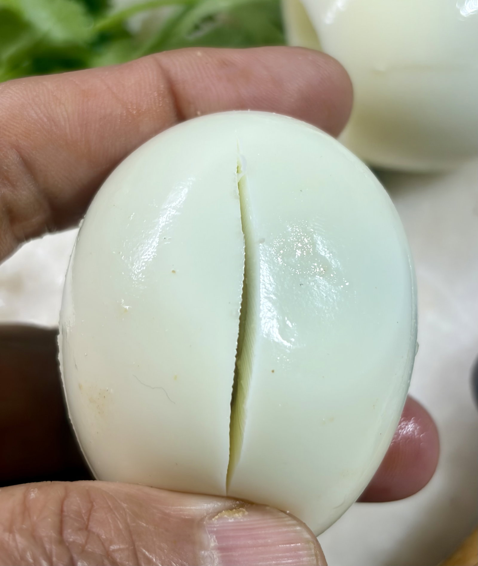 Step 1.1: Peel the hard-boiled eggs and make small slits with a knife to allow the spices to penetrate