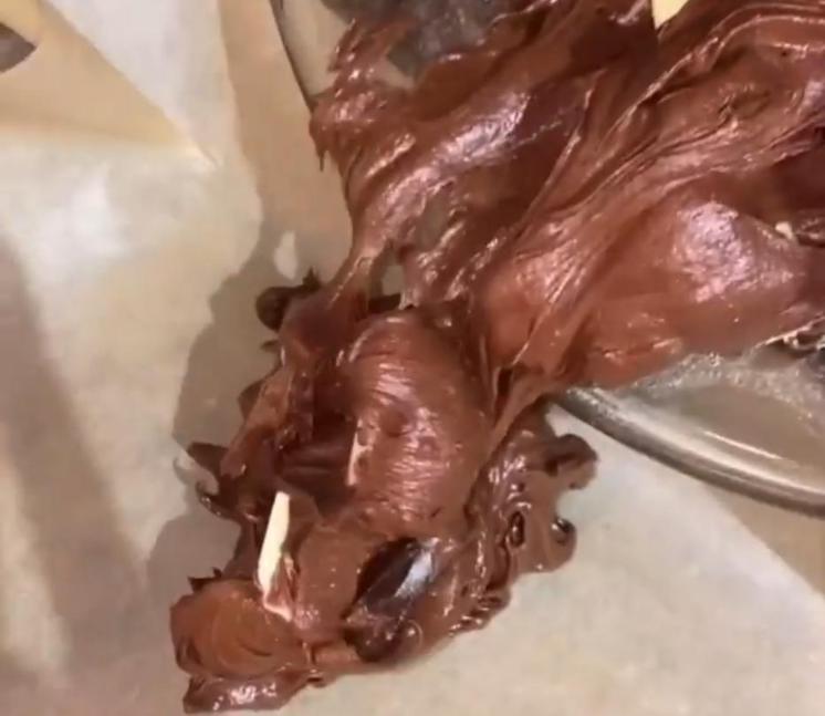 Step 1.1: Pour the batter into a tray lined with a baking sheet and level the top