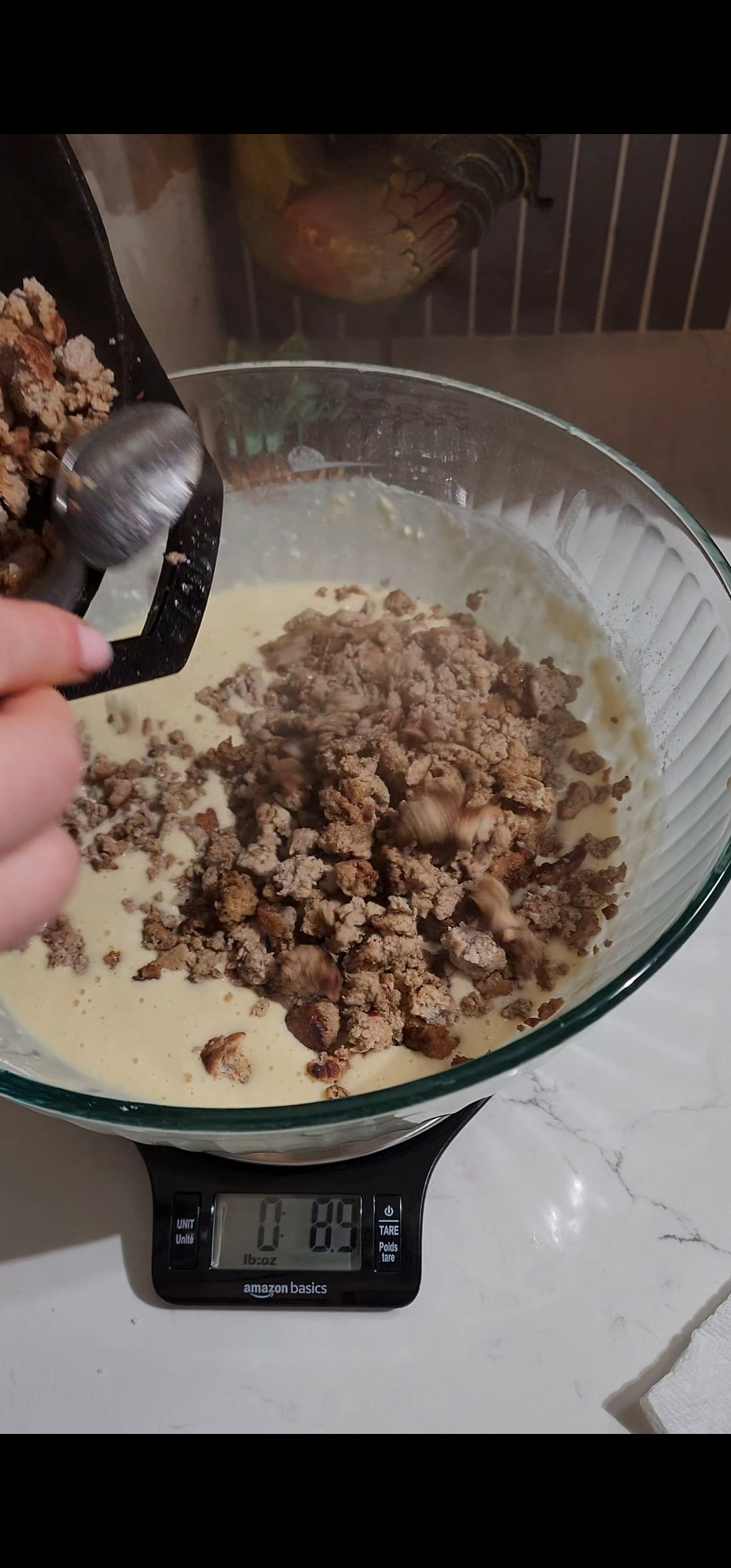 Step 2.1: Fold in the cooked sausage and cheddar cheese