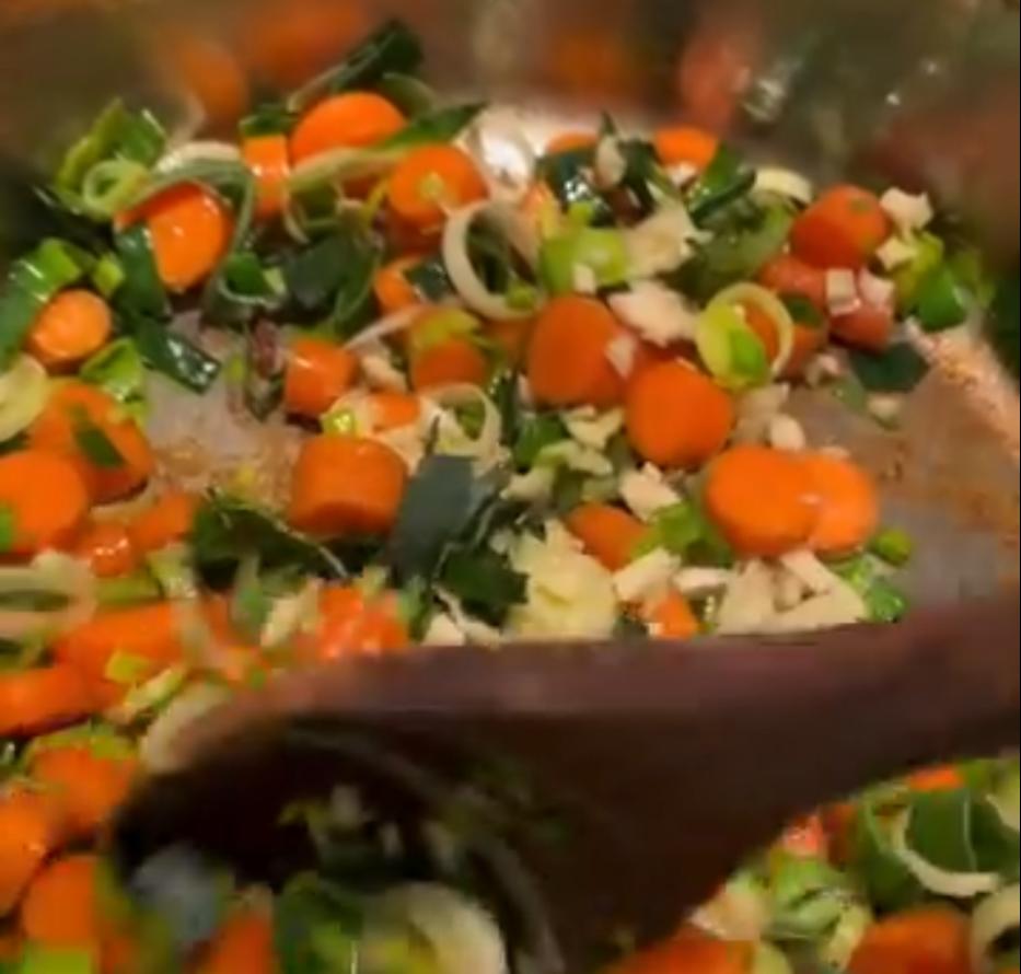 Step 1.1: Add chopped carrots and sliced leek to the pot, cook for 3–5 minutes until softened