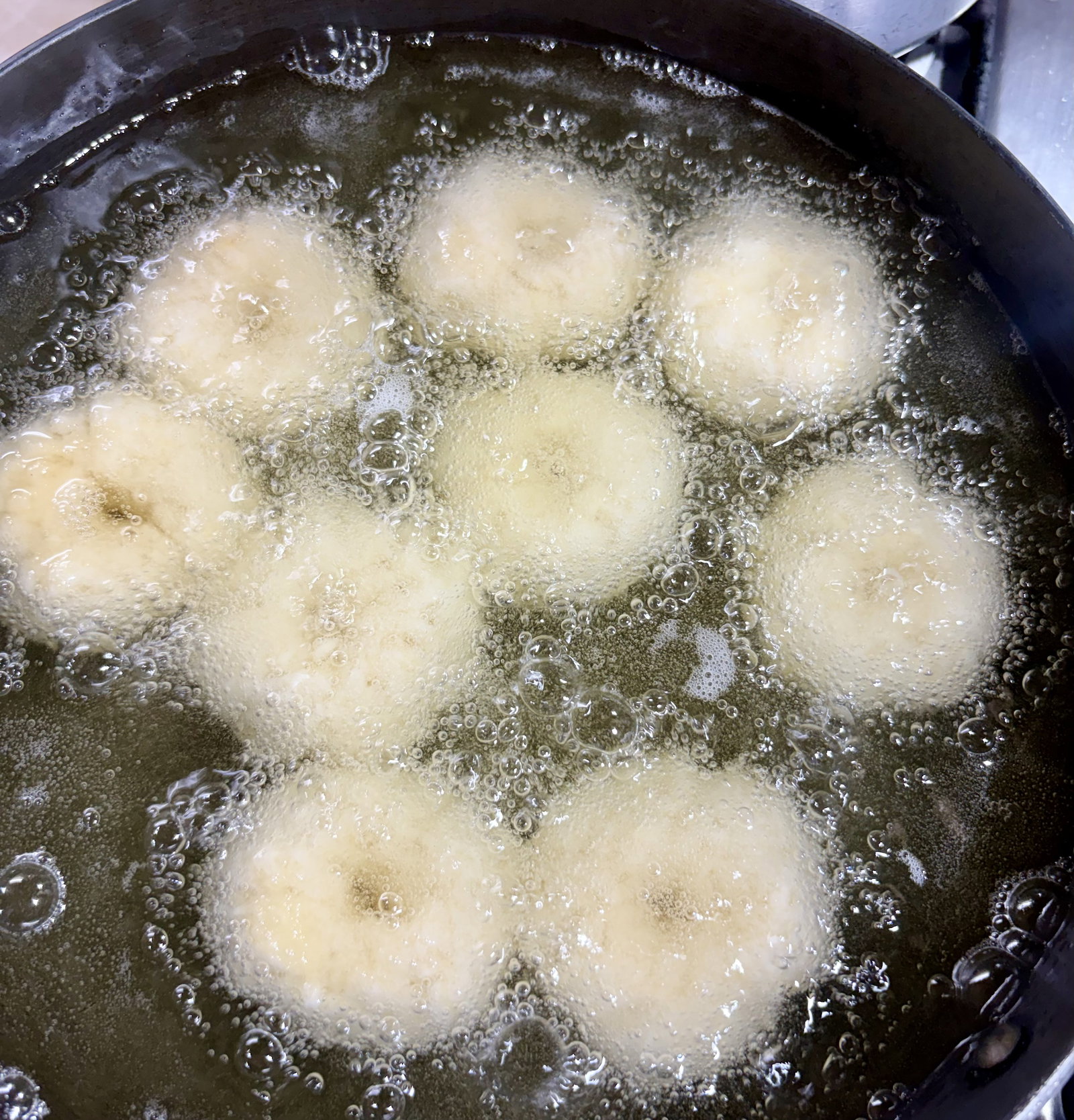 Step 2.1: Add the balls to the pan and fry for 4-5 minutes on low flame