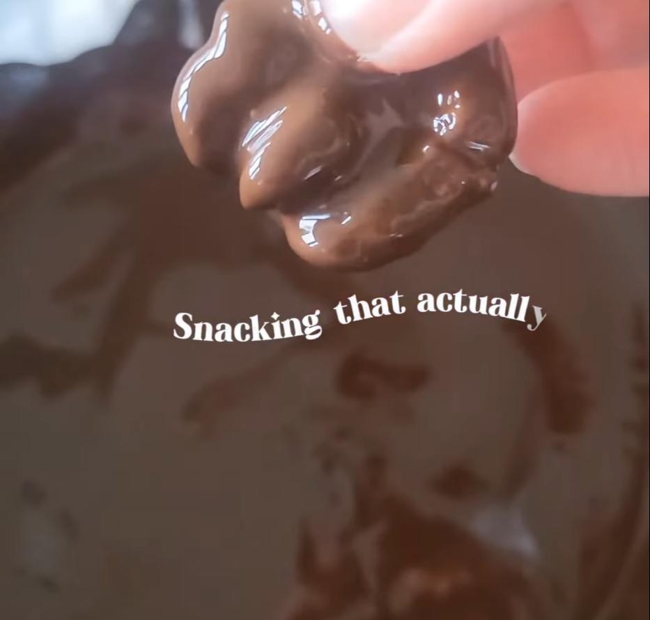 Step 1.1: Dip the walnuts in the melted dark chocolate and place them on greaseproof paper