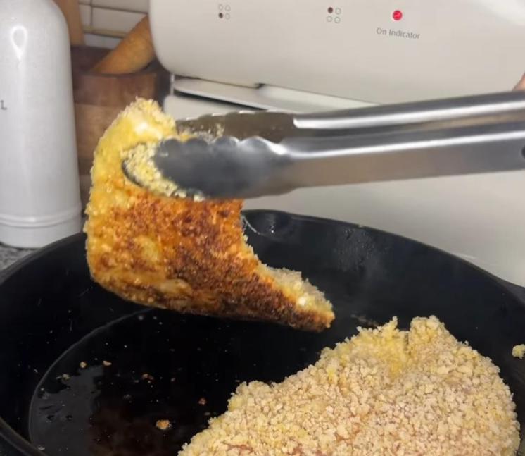 Step 1.1: Heat olive oil in a cast iron skillet and shallow fry chicken until both sides are crispy and browned, and internal temperature reaches 165°F