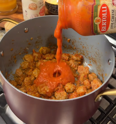 Step 1.1: Pour in marinara sauce, chicken broth, pasta, and red pepper flakes
