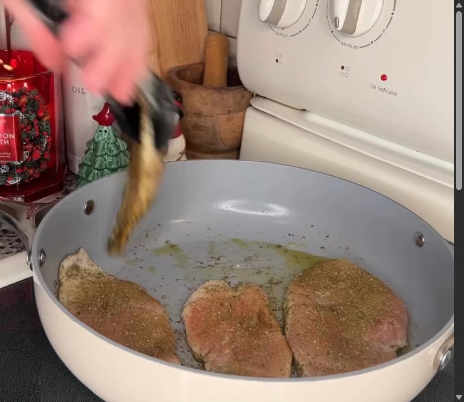 Step 1.1: Heat olive oil in a large sauté pan and cook chicken breasts on both sides until golden and cooked through