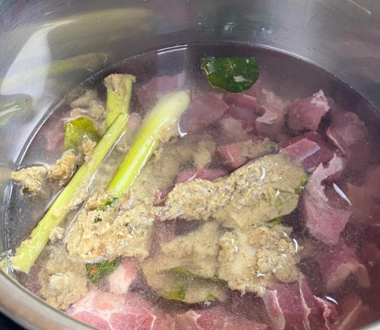 Step 1.1: Add water, beef, salt, and the spice paste to a pot
