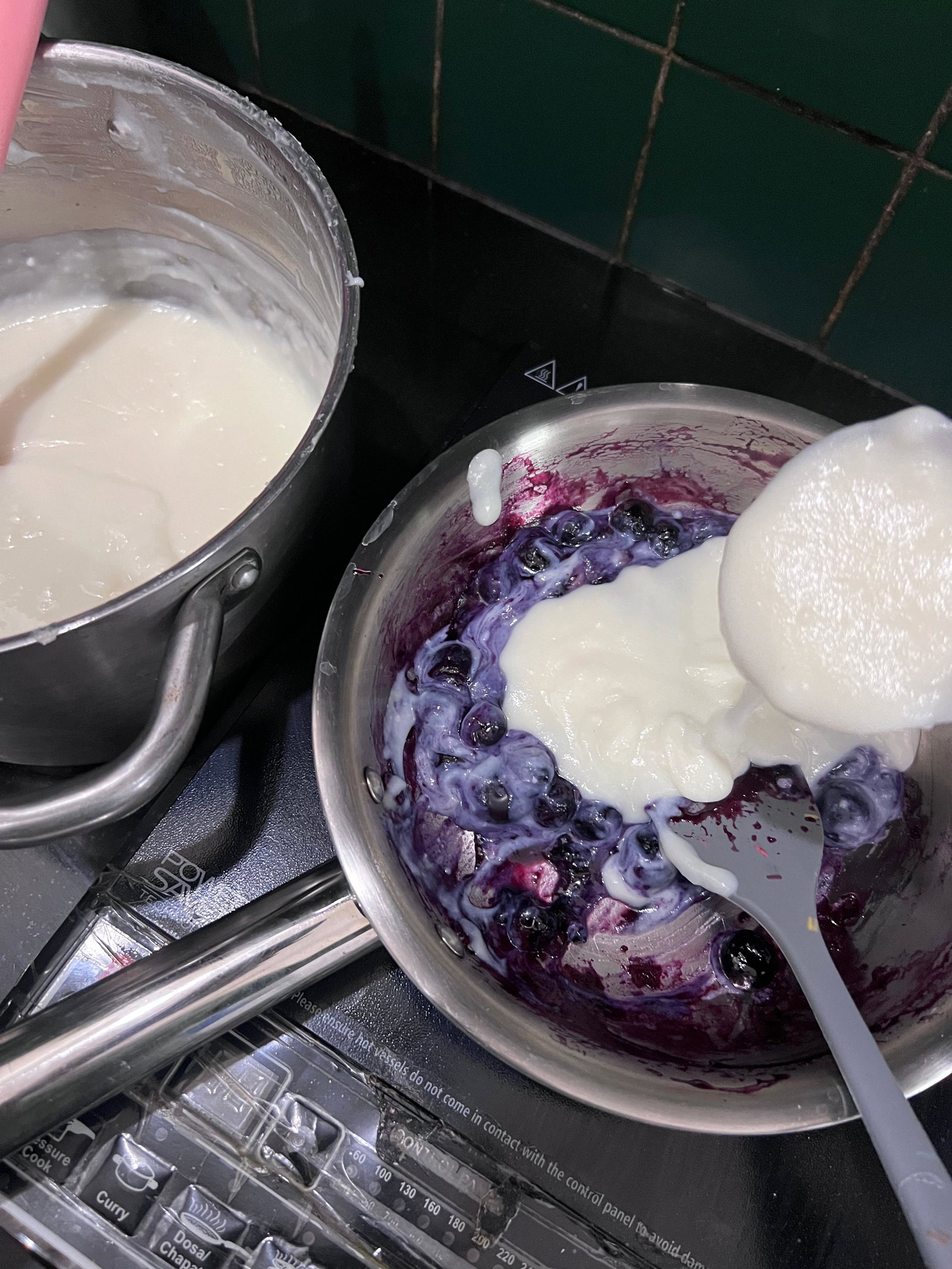 Step 1.1: Let both the phirni and blueberry mixture cool slightly, then gently mix the compote into the phirni