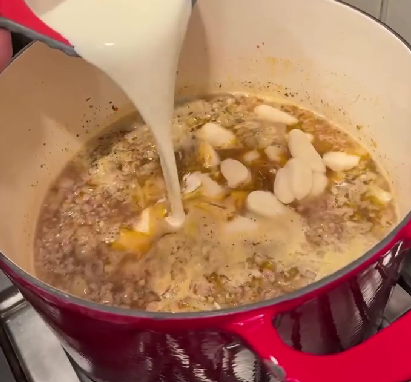 Step 4.1: Stir in heavy cream and gnocchi