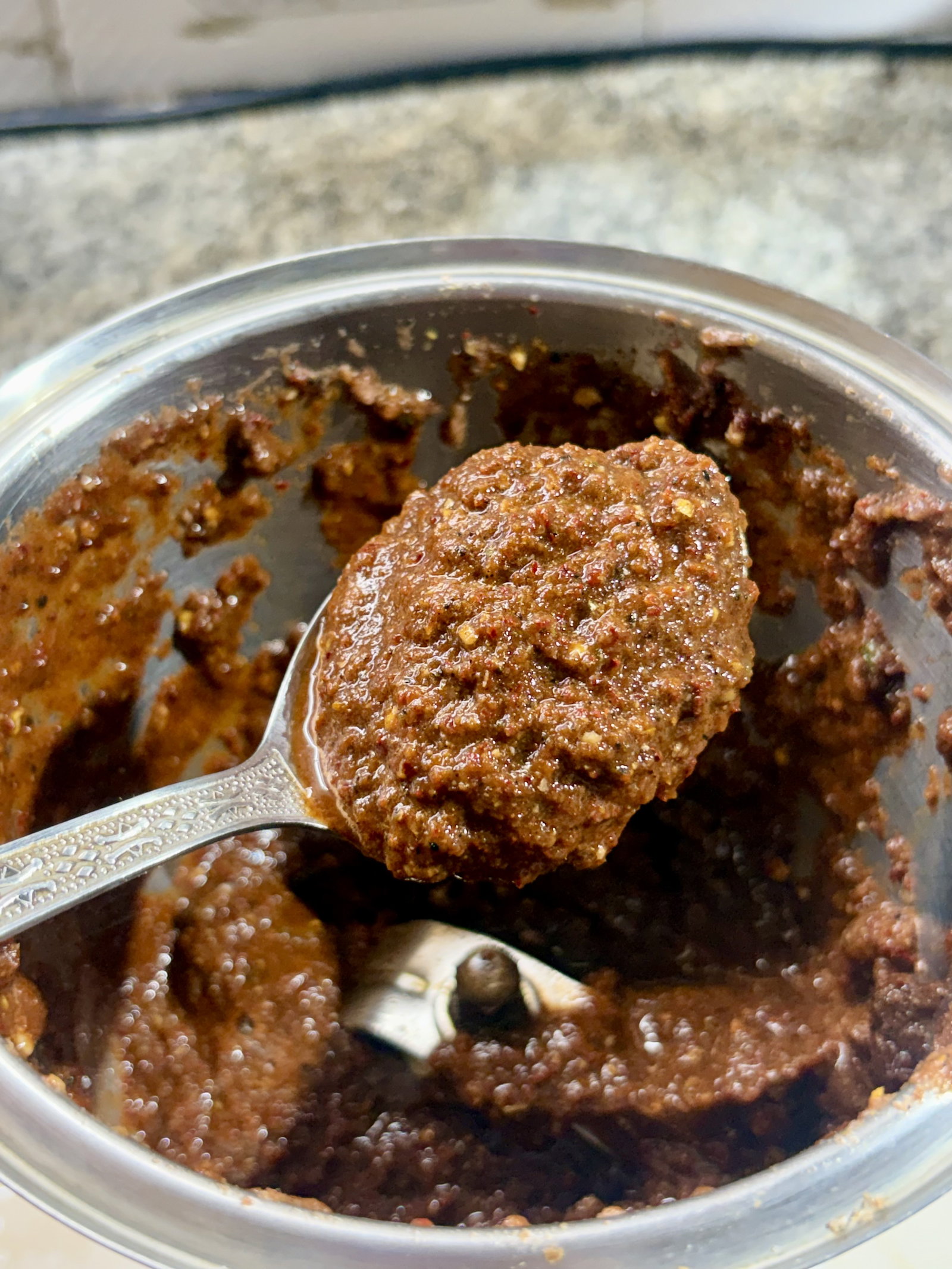 Step 2.2: Blend the charred cinnamon with all the other Masala Paste ingredients until it becomes a smooth, vibrant paste