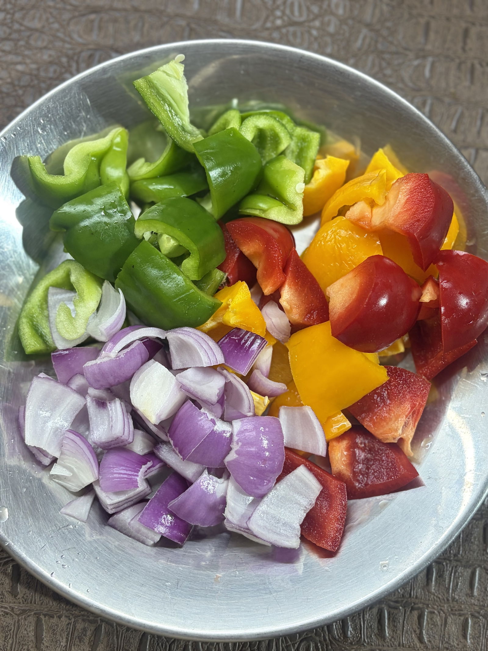 Step 1.1: Cut the bell peppers and onions into medium-sized cubes (petals)