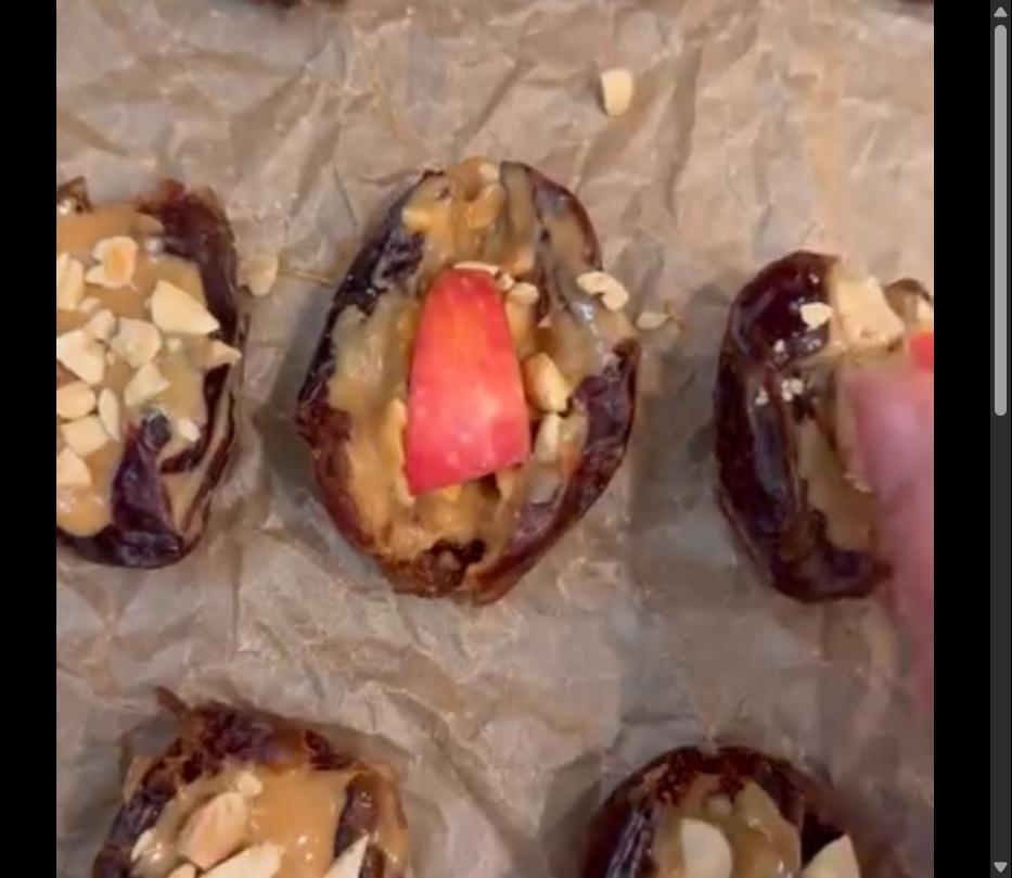 Step 1.1: Sprinkle ground cinnamon onto diced apples, then place the apple pieces into the center of each date