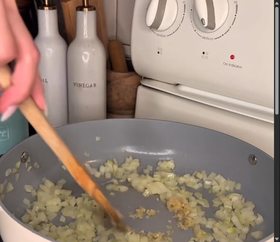 Step 2.1: Heat olive oil in a pan and sauté diced onion and garlic until fragrant