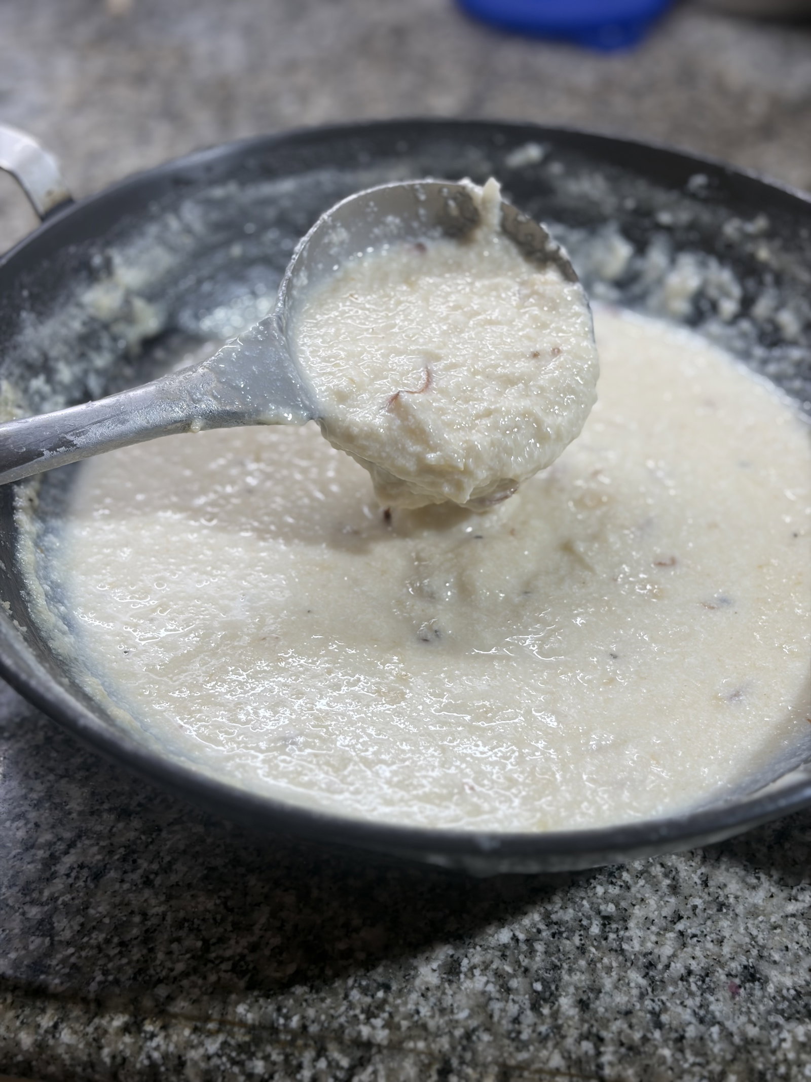 Step 1.2: Switch off the heat and stir in the kewra water