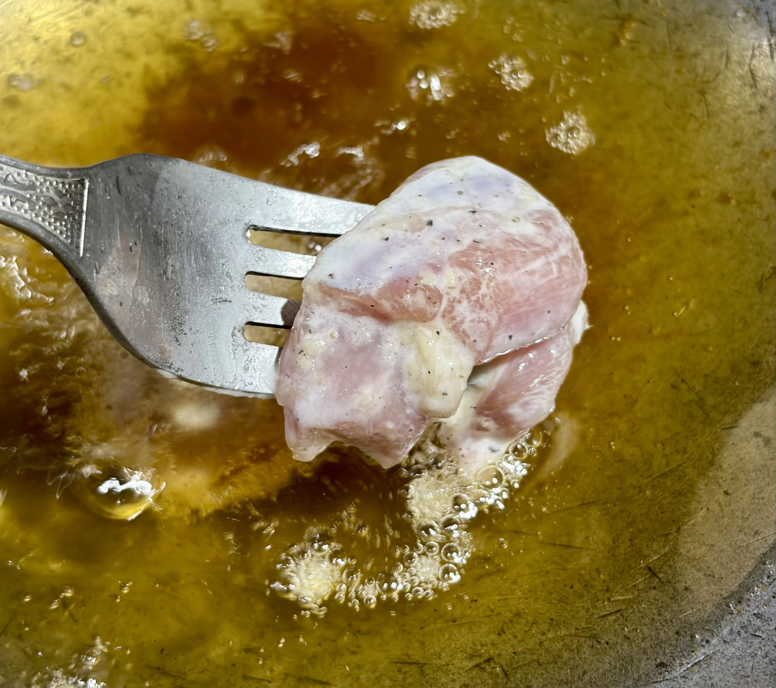 Step 1.2: Heat oil in a pan