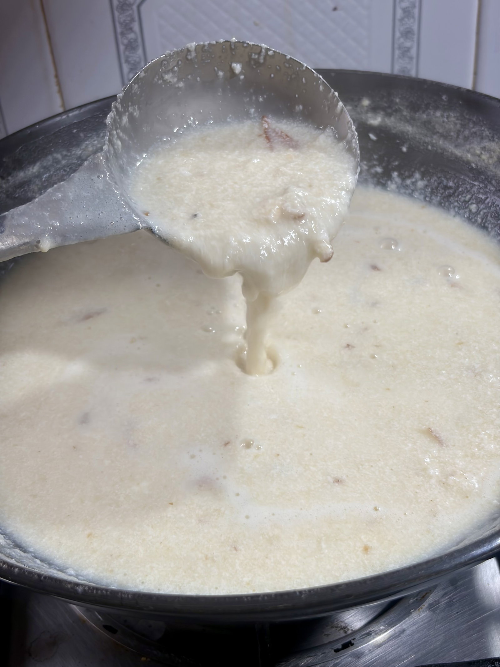 Step 1.1: Switch off the heat and stir in the kewra water