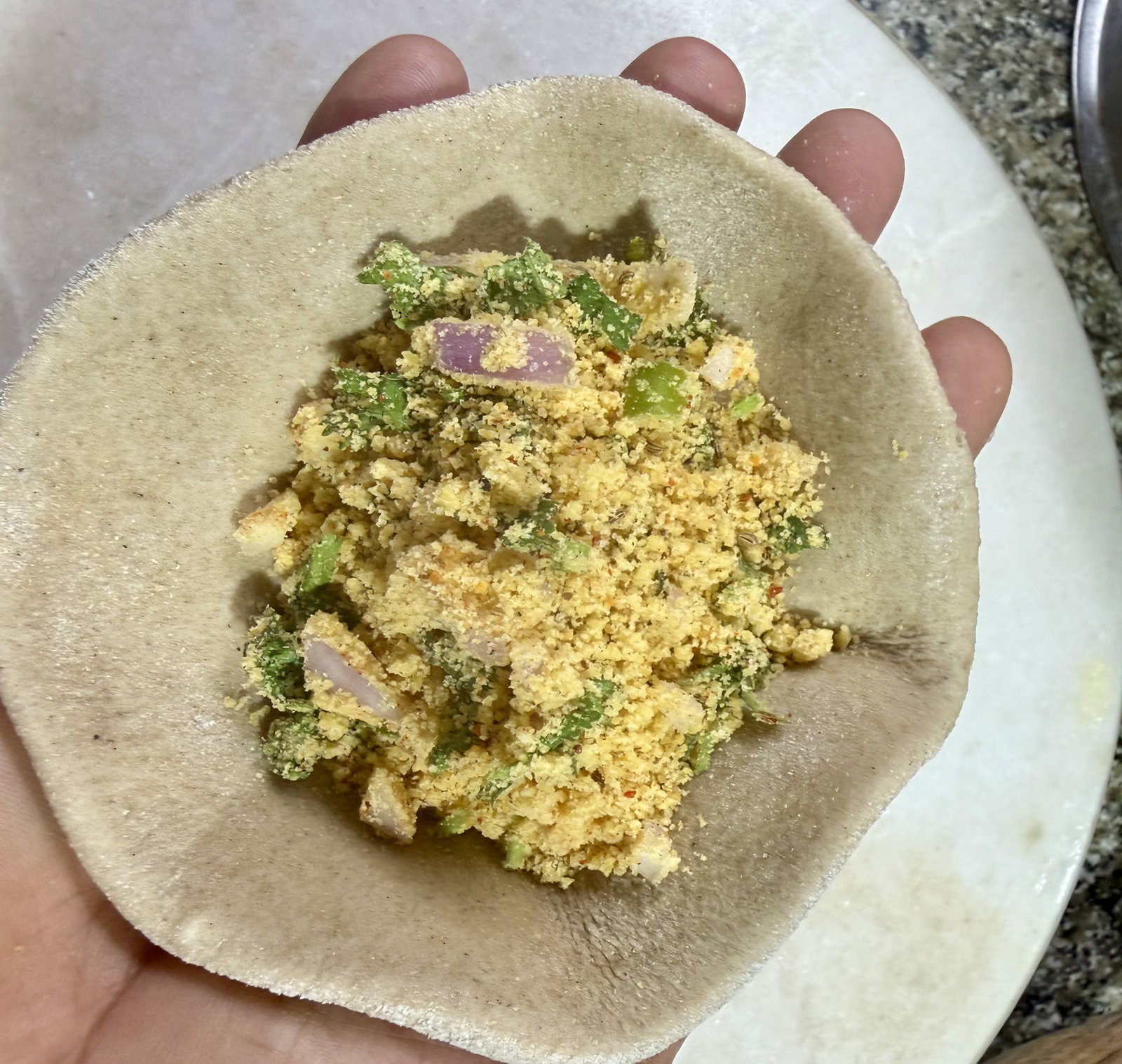 Step 3.1: Place a generous amount of the stuffing in the centre