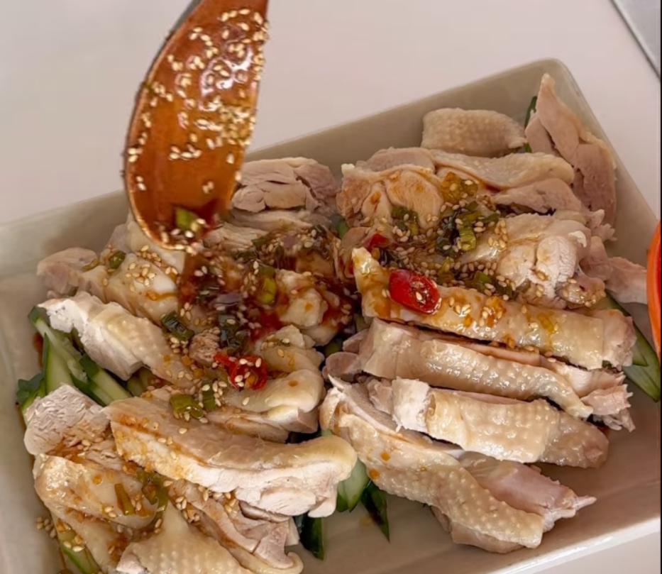 Step 1.1: Slice the chicken, lay it over the cucumber, pour the sauce on top, and serve