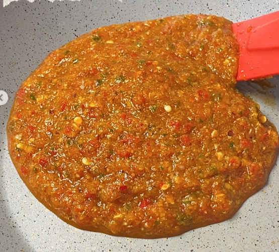 Step 2.1: Sauté the spice paste in a pan until fragrant
