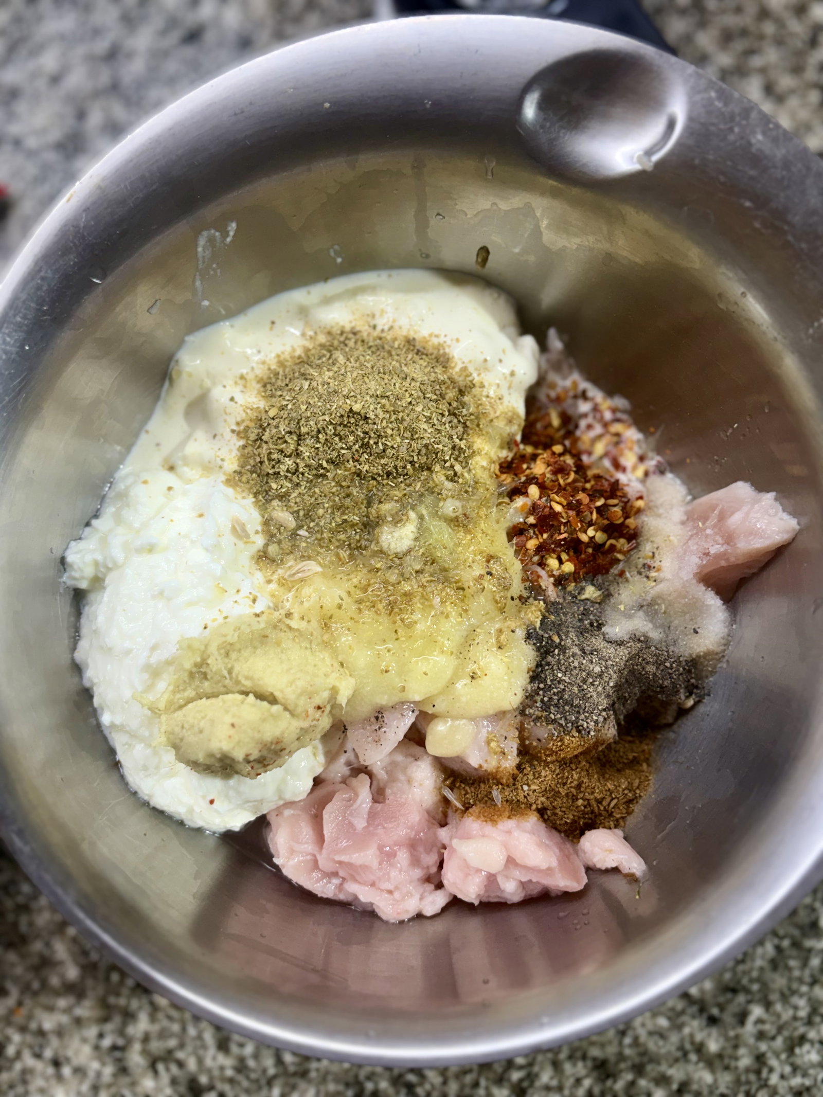 Step 1.1: Whisk together the yogurt, cream, ghee, ginger-garlic paste, coriander powder, chilli flakes, black pepper, cumin powder, lemon juice, and salt in a large mixing bowl