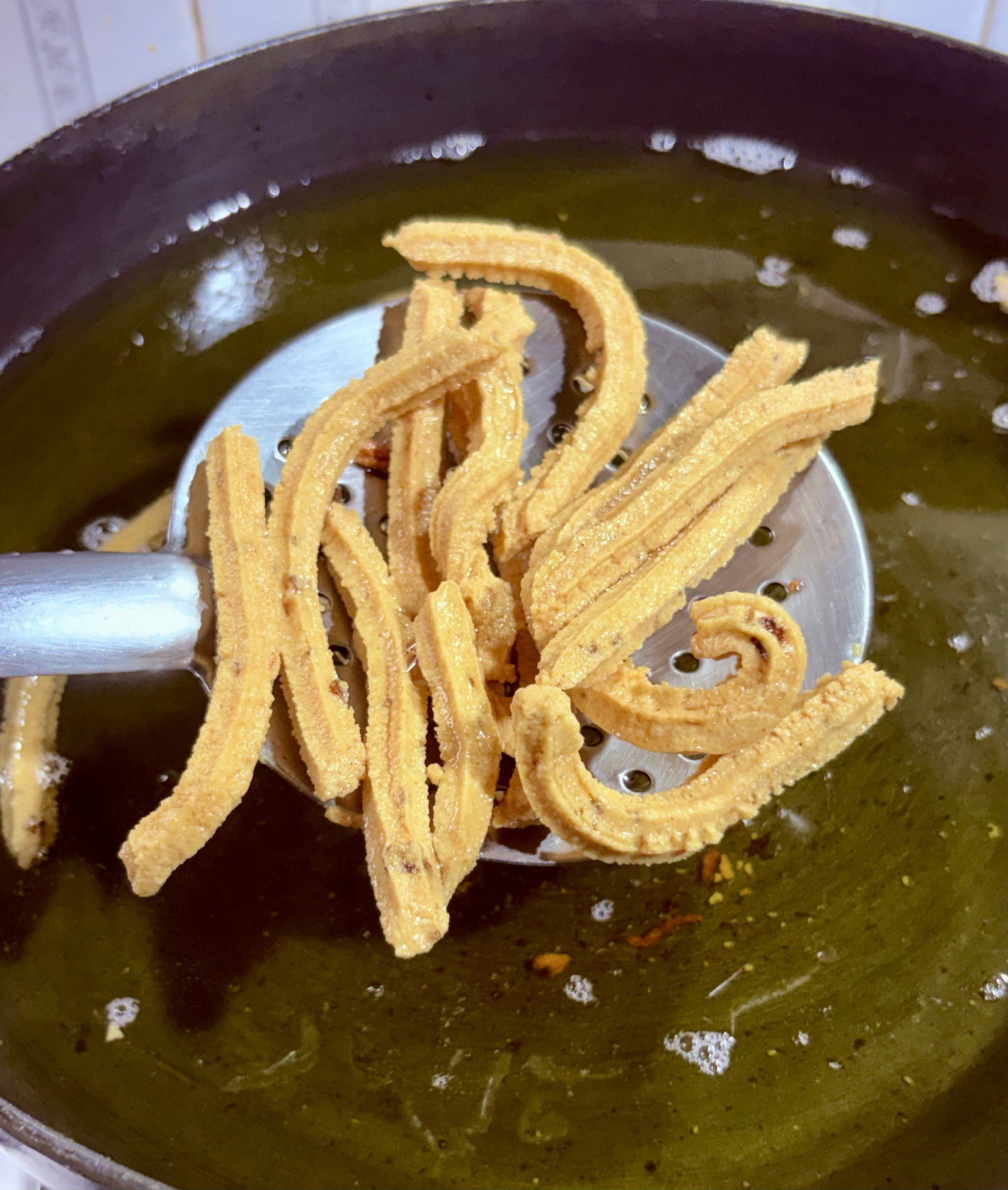 Step 5.1: Fry in batches over medium heat, flipping occasionally until golden and crisp
