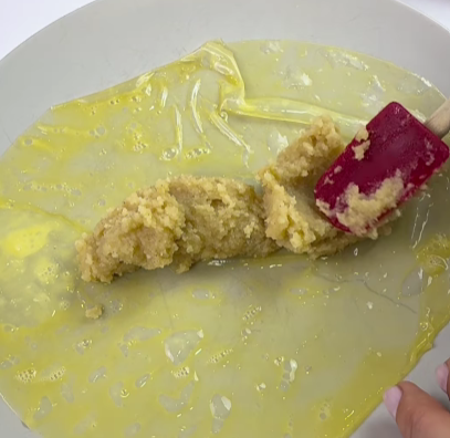Step 1.1: Lay the rice paper flat and spread the almond filling in the center