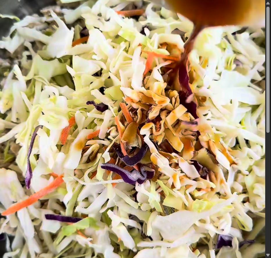 Step 3.1: Add coleslaw mix and the prepared sauce to the pan