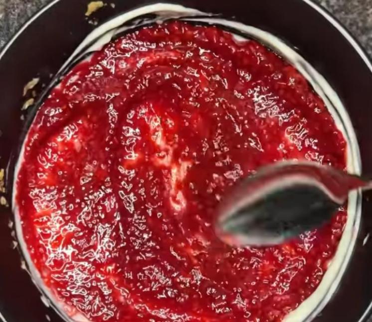 Step 1.1: Add the raspberry jam on top of the yoghurt layer