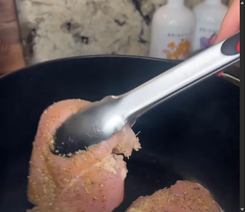 Step 1.1: Heat olive oil in a large pot and brown both sides of chicken breasts until golden, then remove from the pan