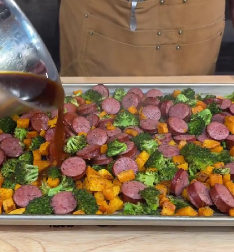 Step 4.1: Pour the sauce over the sausage, sweet potatoes, and broccoli