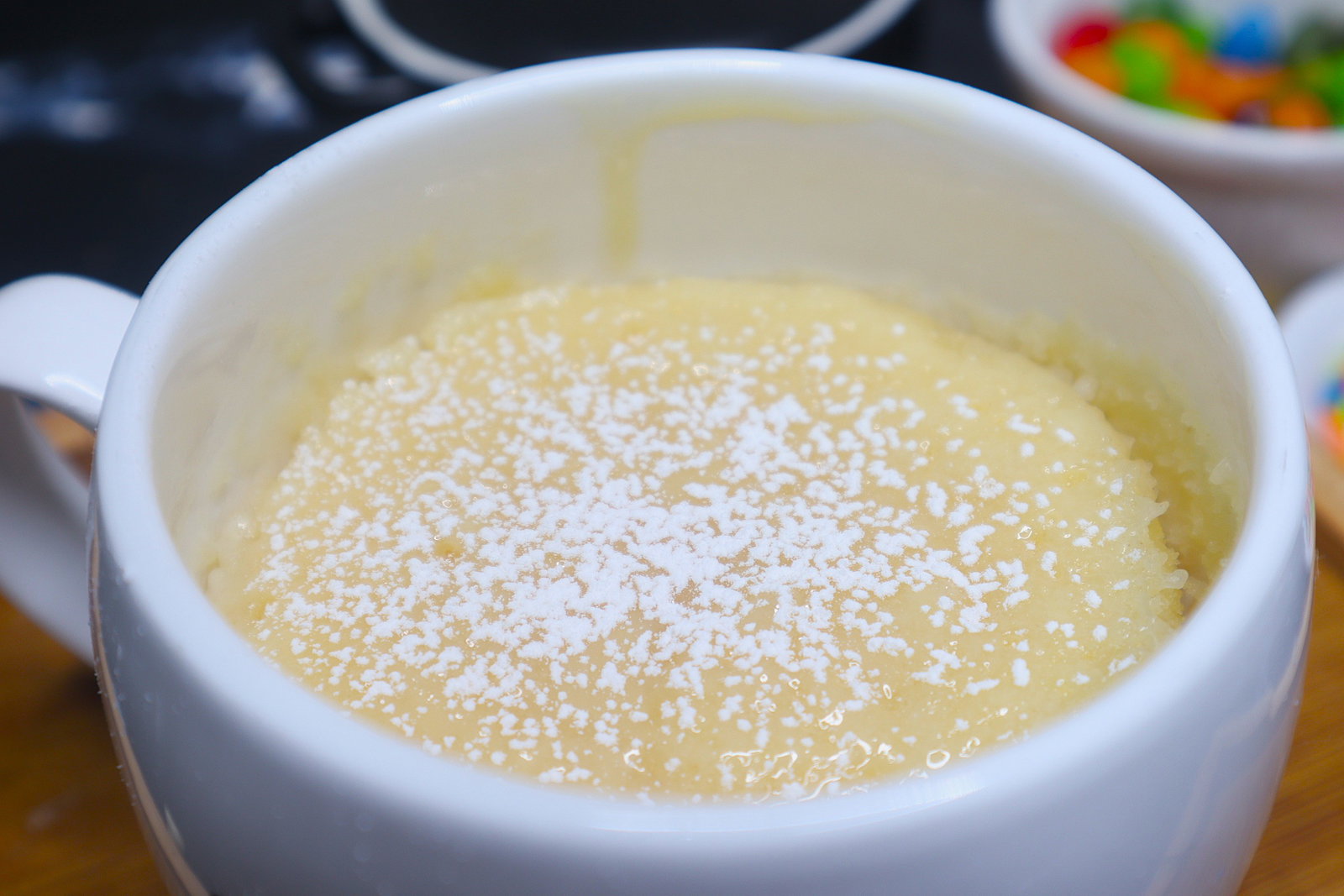 Step 1.2: Spread 1 teaspoon of condensed milk over the warm cake and let it melt into the top