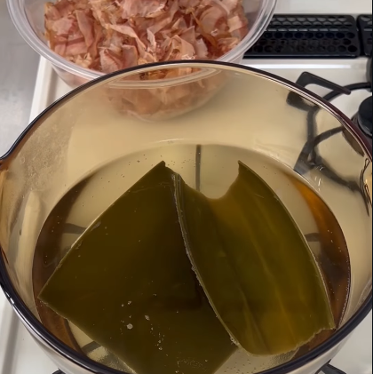 Step 1.1: Combine the water and kombu in a pot and heat gently over medium heat