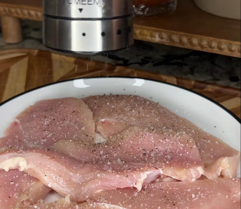Step 1.1: Season the chicken breasts with salt, pepper, garlic powder, and thyme