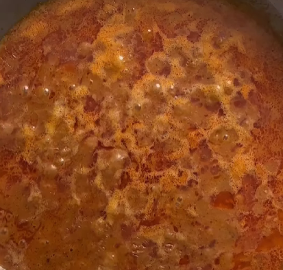 Step 1.1: Fry the red curry paste in 100mL of coconut milk until fragrant and the oil separates