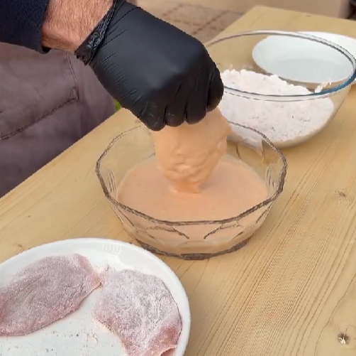 Step 2.1: Coat the chicken pieces first in the dry flour mix and let it absorb