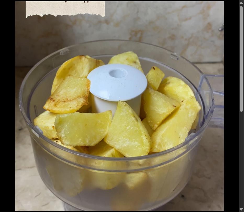 Step 1.1: Mash the potatoes while still warm until smooth using a chopper