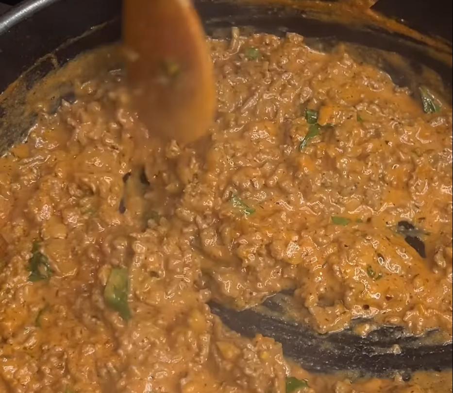 Step 1.1: Add the fresh basil, dried thyme, and dried oregano, stirring to combine