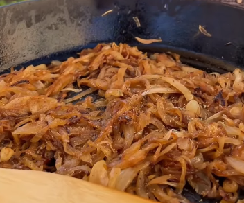 Step 2.1: Add thinly sliced onions and cook for at least 30 minutes, stirring occasionally, until they turn deep brown and caramelized