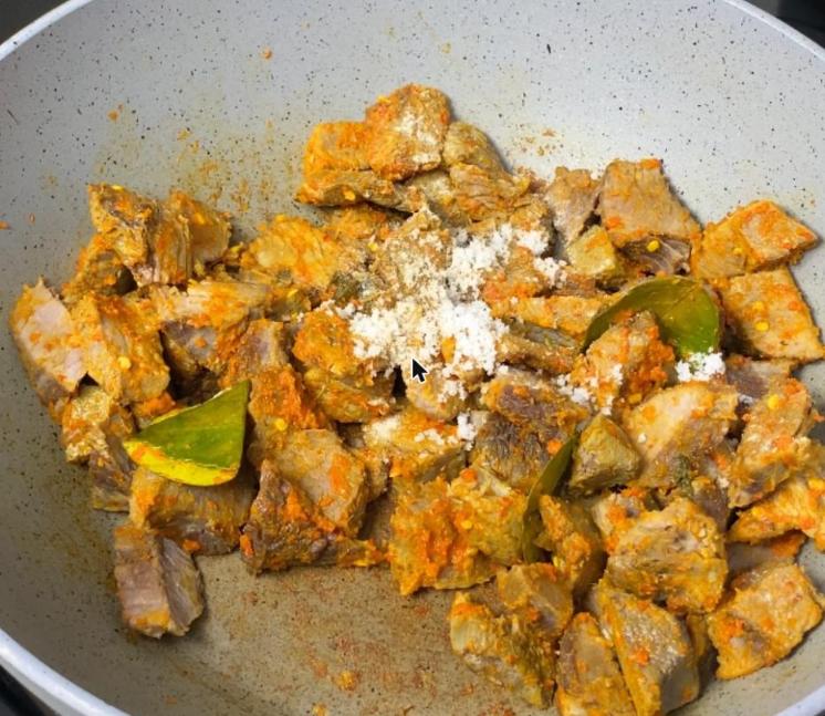 Step 5.1: Cut the beef into small pieces and mix with reserved spice paste