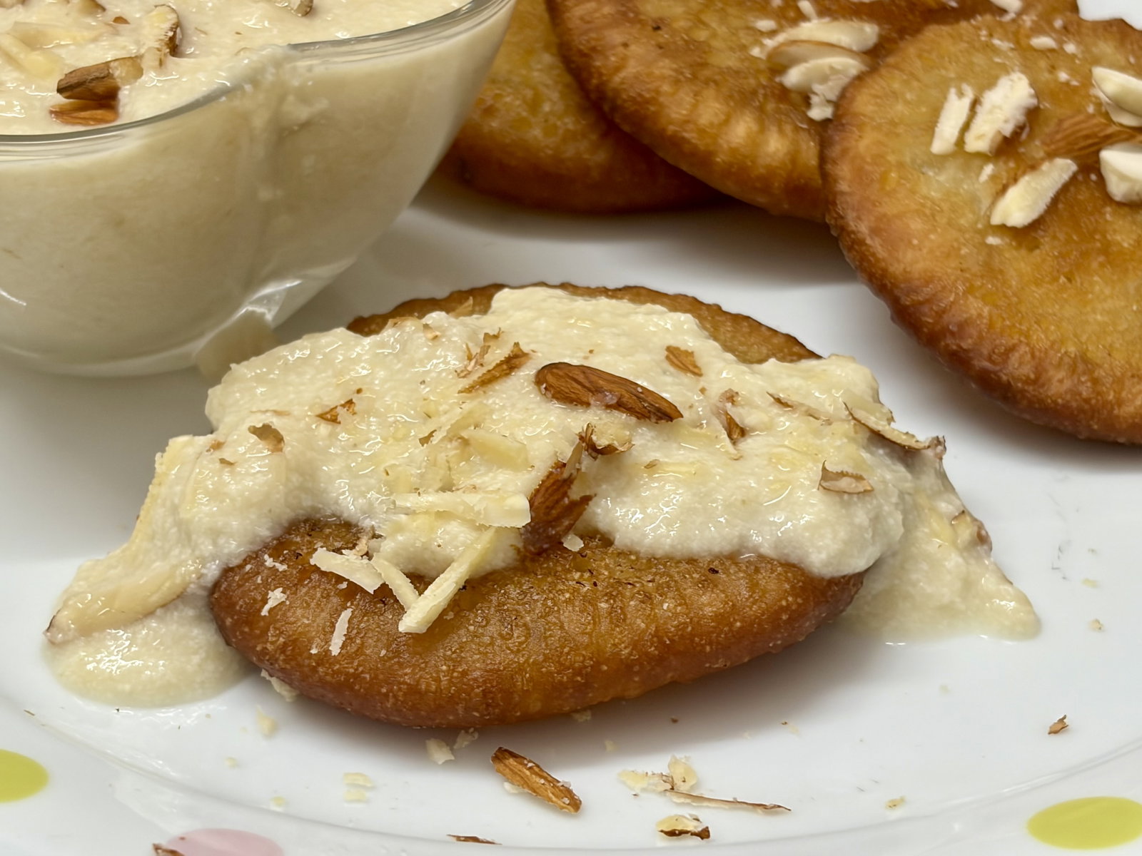 Step 2.1: Serve them hot with a big scoop of creamy [Rabdi](https://www