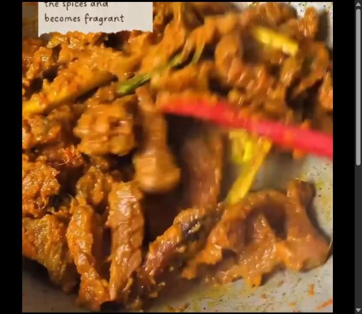 Step 5.1: Stir well and cook until the beef is evenly coated with the spices and becomes fragrant