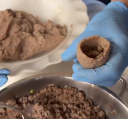 Step 3.1: Fill the hollow shell with the prepared meat filling