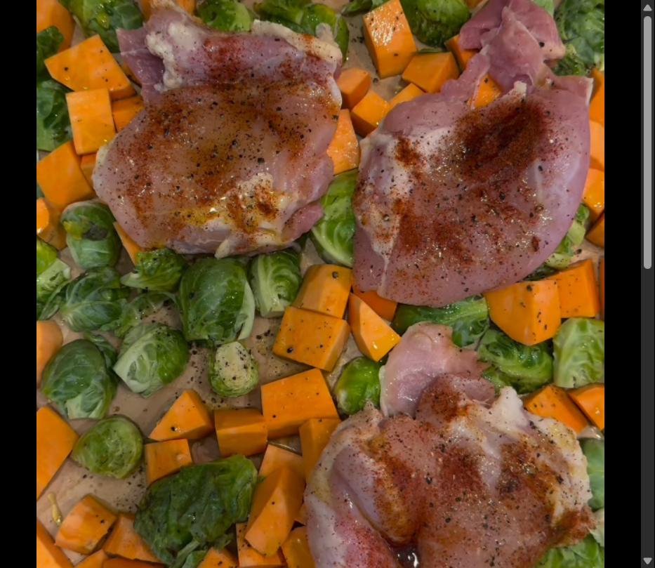 Step 1.1: Place chicken thighs on top of the sweet potatoes and Brussels sprouts