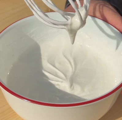 Step 1.1: Put the yogurt mixture on top of the biscuit layer